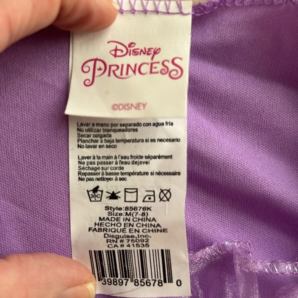 NWT Disney Princess Rapunzel Dress Up Dress. Girls Size M 7/8. Runs long. Pretty